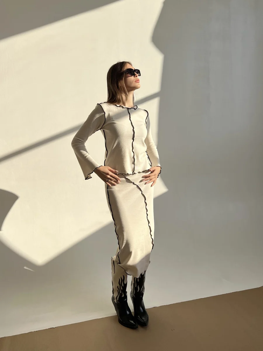 4586A090-F14F-45AB-83FD-7987BAD1DAB5 Griz Suit - Cream - Image 1